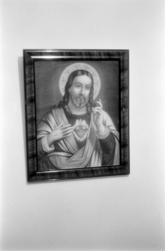 [ PHOTO OF PAINTING OF JESUS CHRIST WITH EXPOSED HEART ]