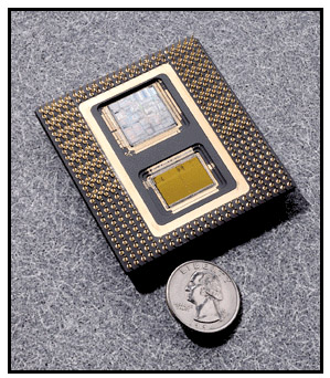 Photo of Intel P6
                  processor next to a quarter.